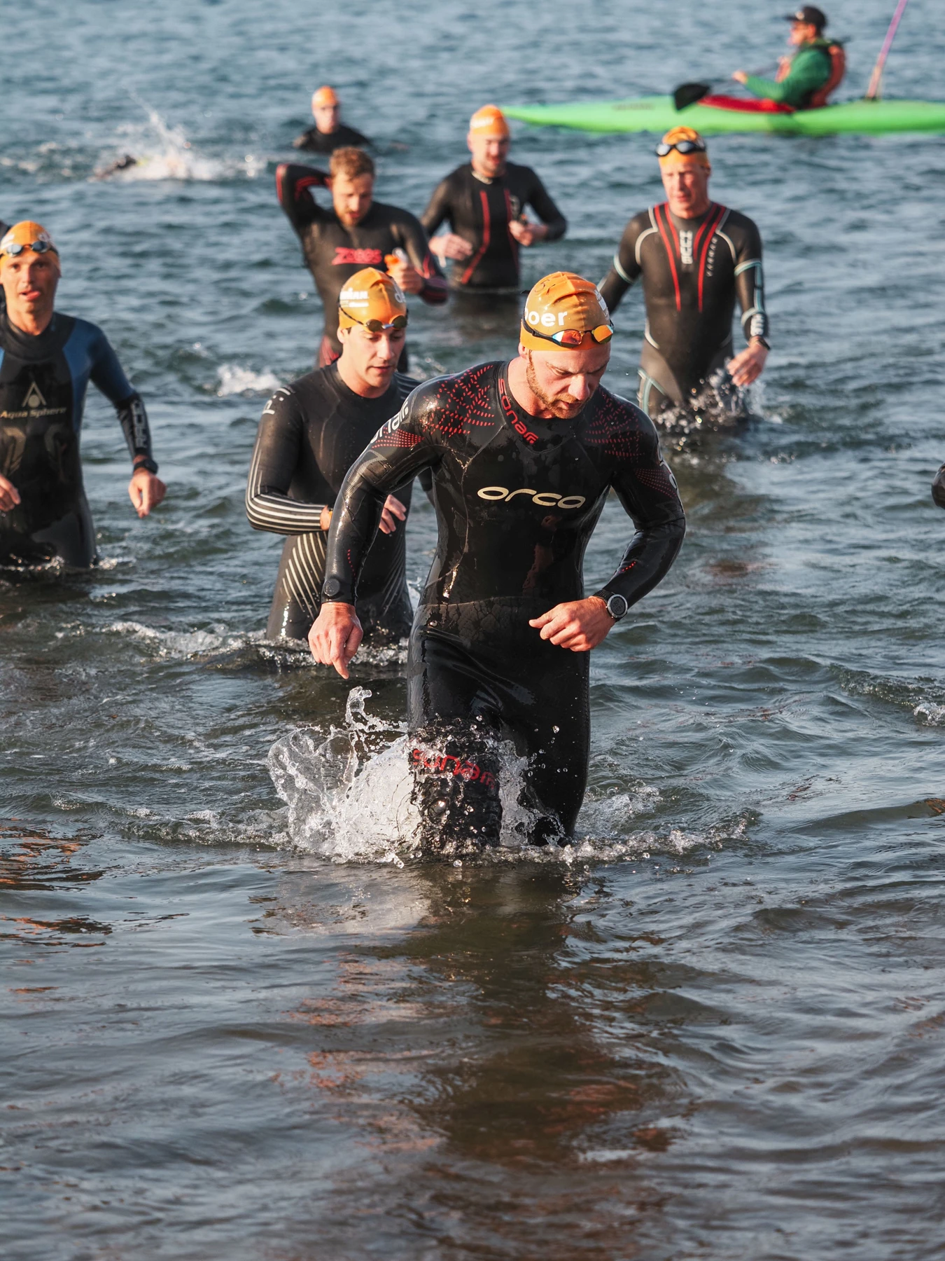 Swimmers leaving the sea at IRONMAN Lanzarote